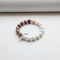 Pink Jaspers and white agate wing charm bracelet