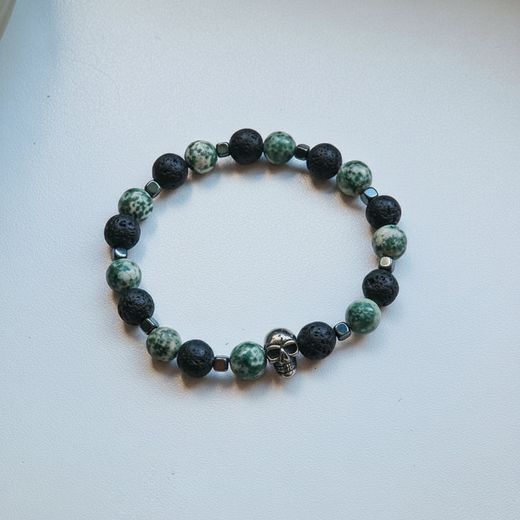Skull bracelet with lava and green beads