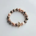 Bracelet with wings charm