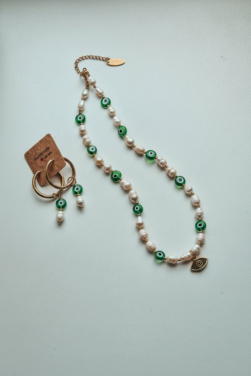 Pearl necklace with green evil eye beads and earings