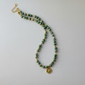 Green beads necklace with pendant