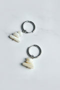 Silver hoop earrings with seashell beads