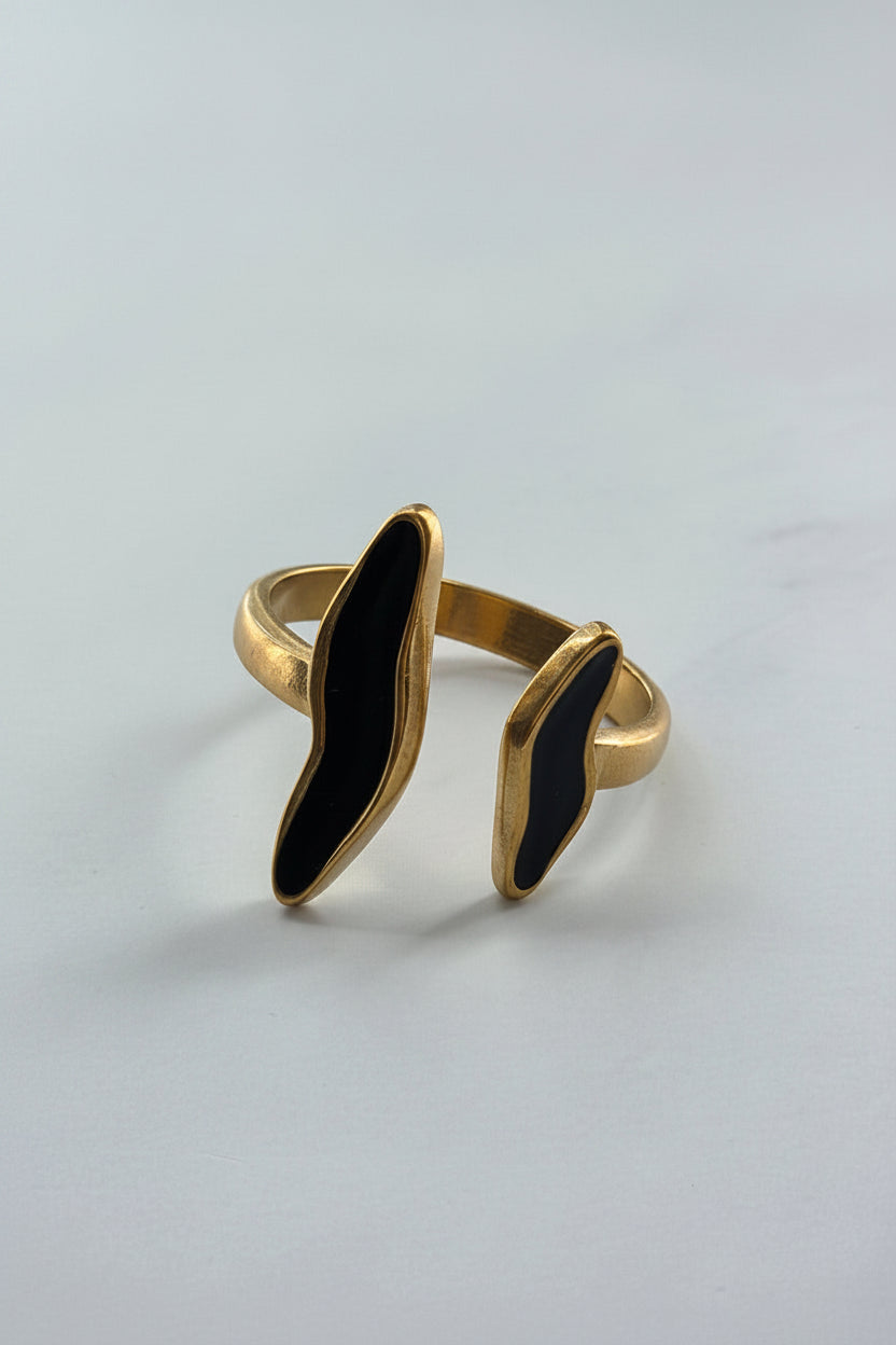 Gold and black ring