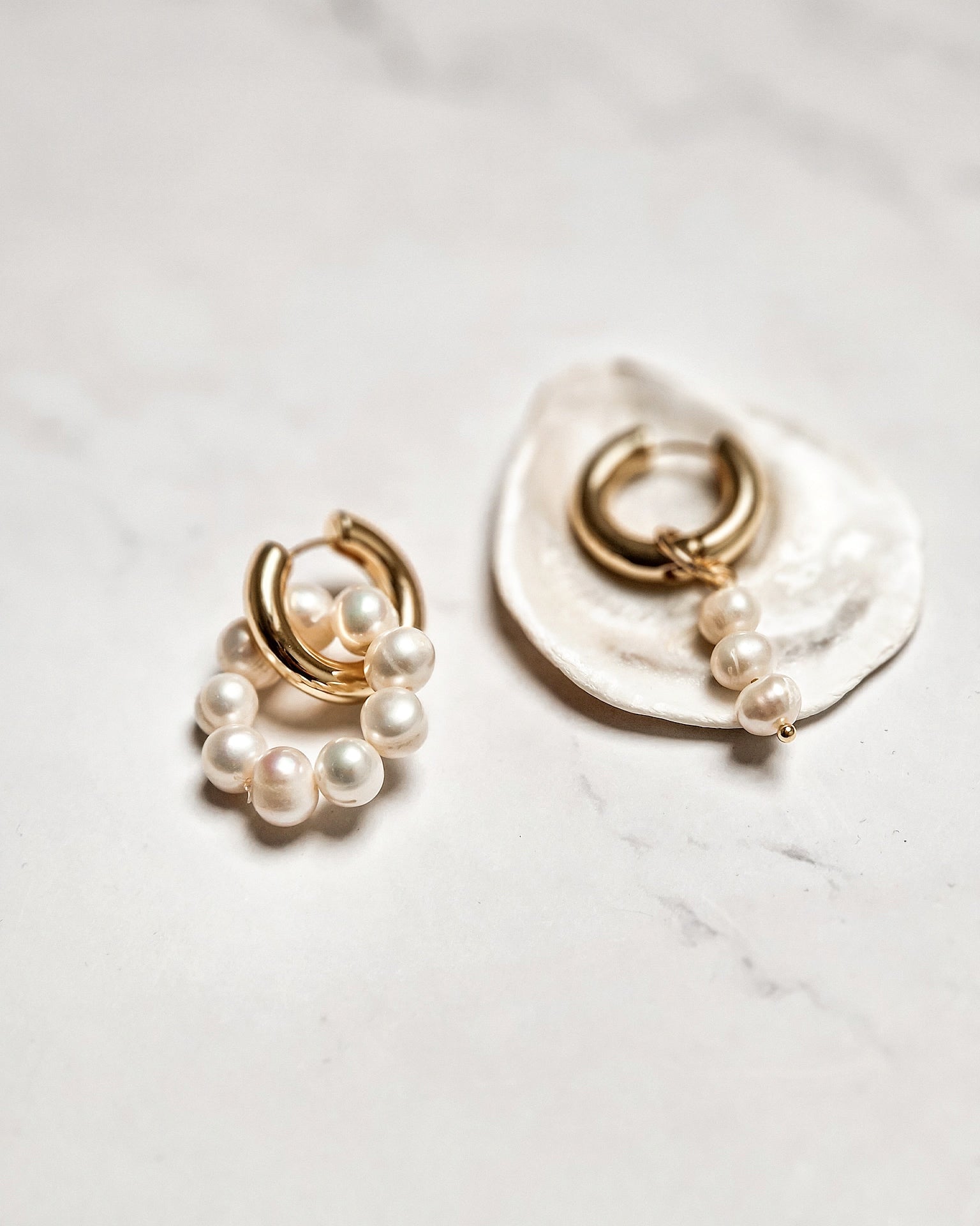 Asymmetric fresh water pearl earrings