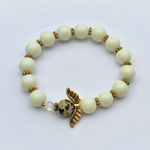 White bracelet with gold spacers