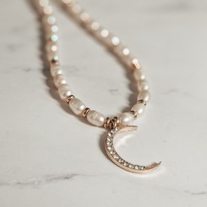 Pearl necklace with moon pendant