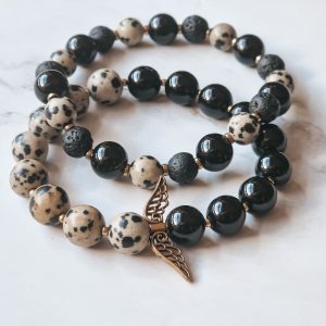 Black and spotted beads bracelets set